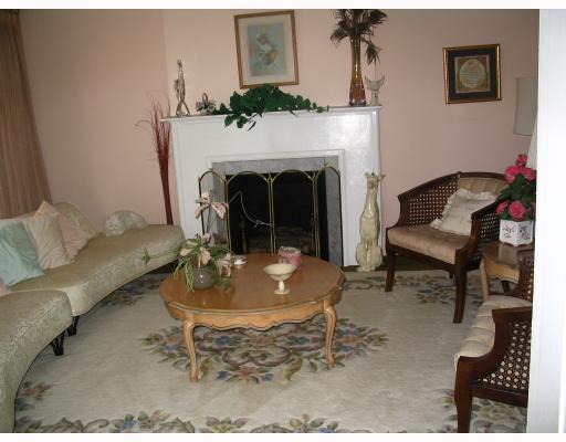 3949 Brighton Road Brighton Heights, PA 15212 - Photo 3 of 8 Living Room. Spacious living room with a fantastic decorative fireplace.