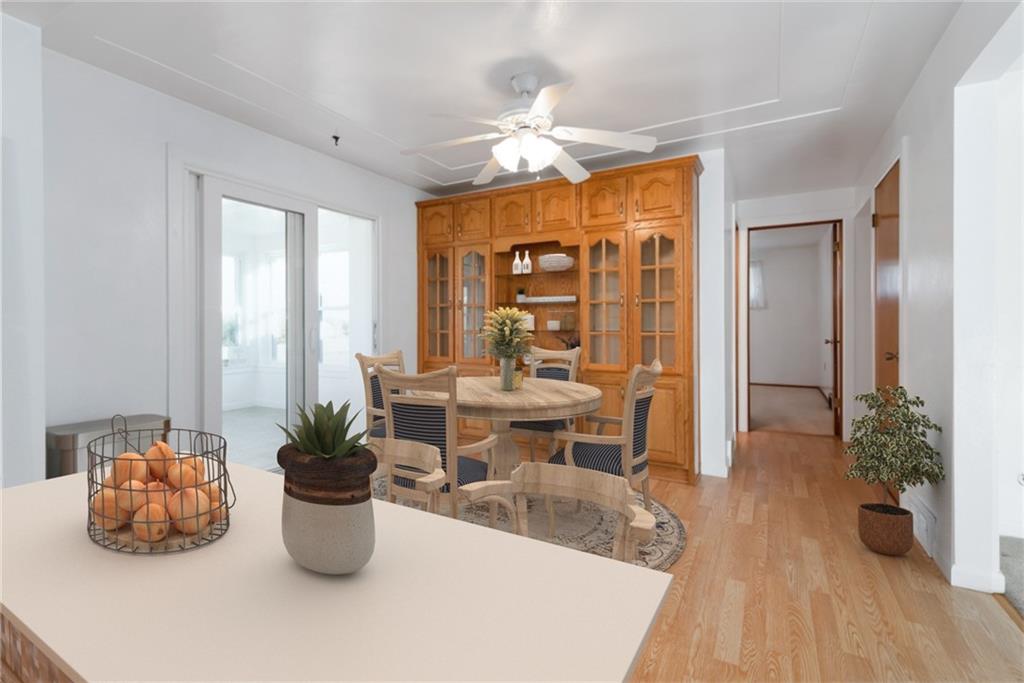 247 Winfield Road Sarver, PA 16055 - Photo 11 of 24 a view of a dining room with furniture window and wooden floor