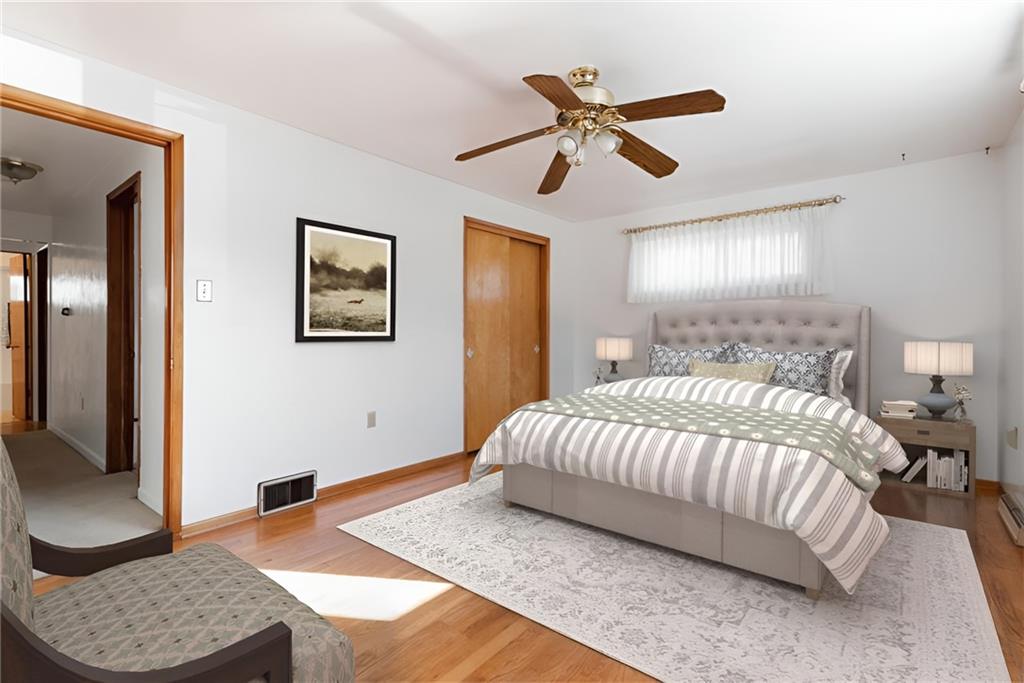 247 Winfield Road Sarver, PA 16055 - Photo 14 of 24 a bedroom with a bed rug and couch