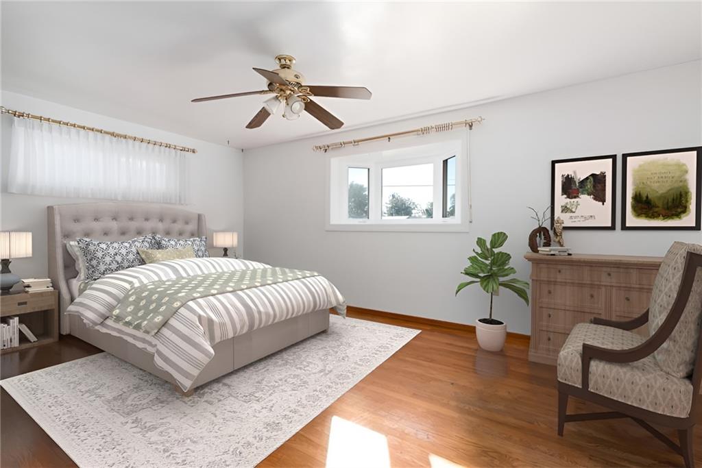 247 Winfield Road Sarver, PA 16055 - Photo 15 of 24 a bedroom with a bed and painting on the wall