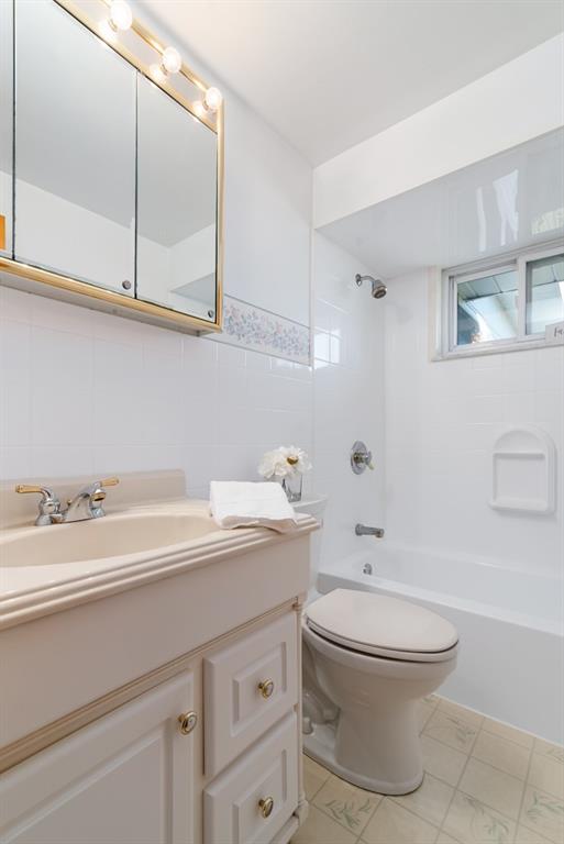 247 Winfield Road Sarver, PA 16055 - Photo 16 of 24 a bathroom with a granite countertop toilet sink and mirror