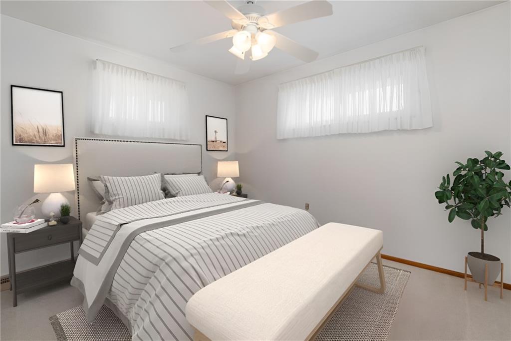 247 Winfield Road Sarver, PA 16055 - Photo 17 of 24 a bedroom with a bed and a potted plant