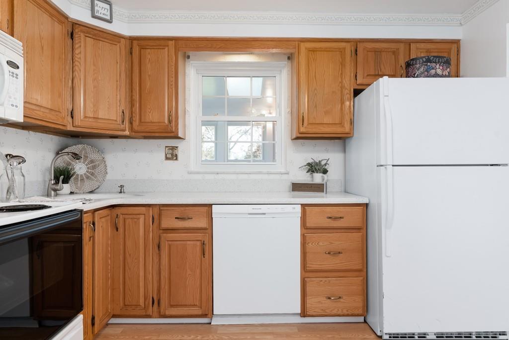 247 Winfield Road Sarver, PA 16055 - Photo 7 of 24 a kitchen with stainless steel appliances granite countertop a refrigerator sink and cabinets