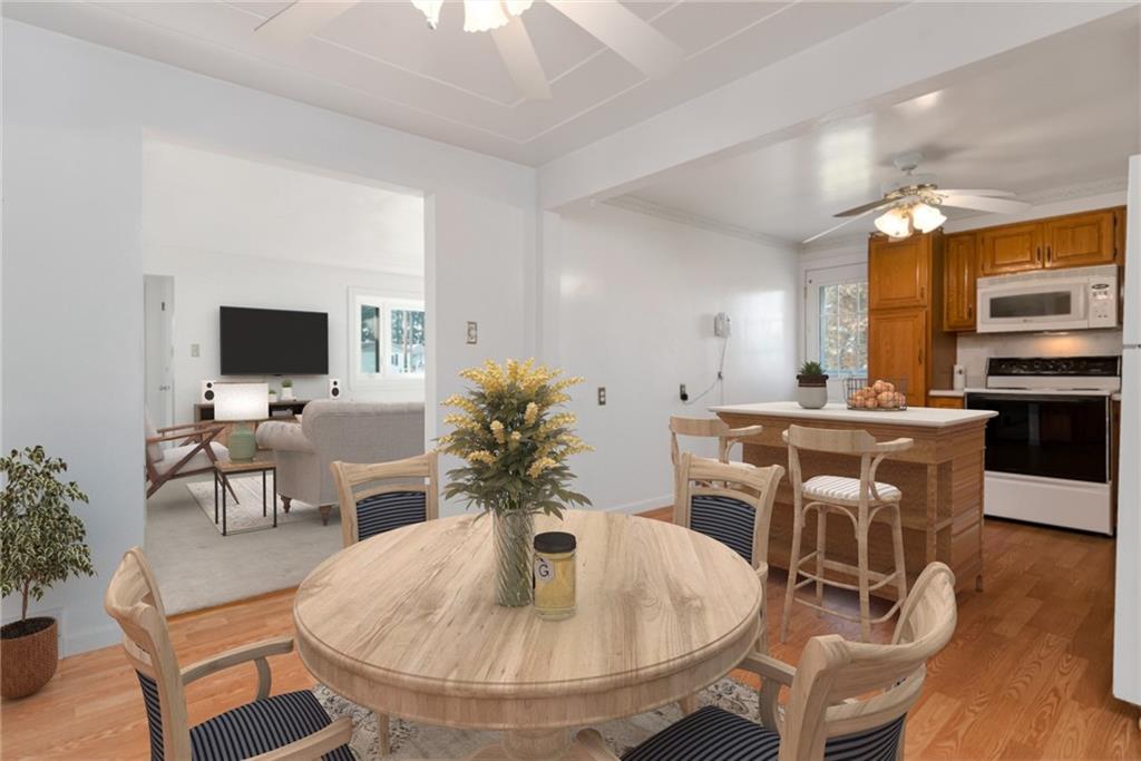 247 Winfield Road Sarver, PA 16055 - Photo 9 of 24 a dining room with furniture and wooden floor