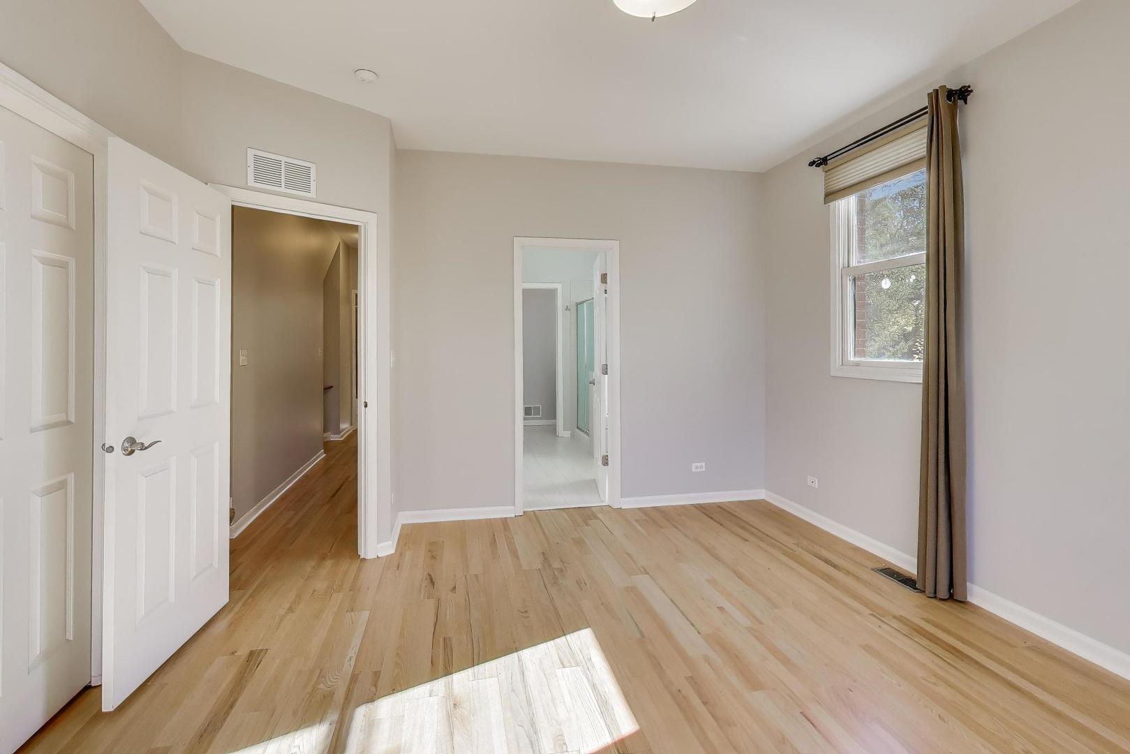 125 North Rose Street, Unit E Palatine, IL 60067 - Photo 15 of 28 a view of hallway with wooden floor