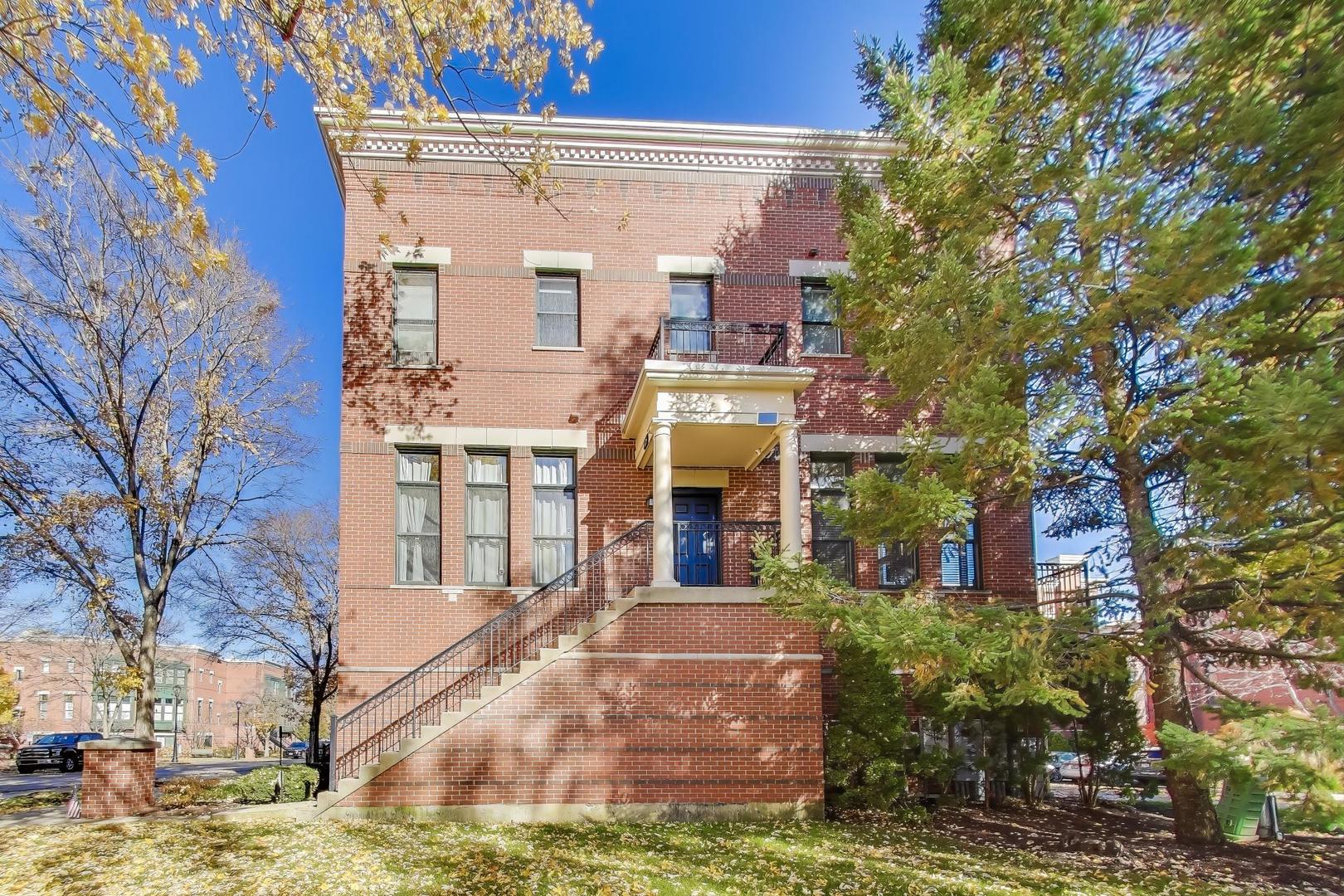 125 North Rose Street, Unit E Palatine, IL 60067 - Photo 2 of 28 a view of a building with a yard