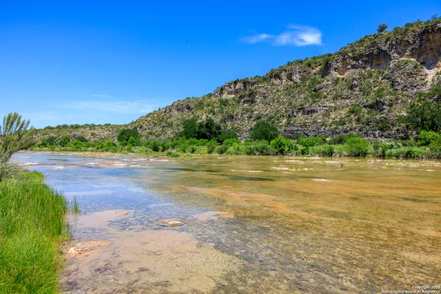 a view of a swimming pool and lake view