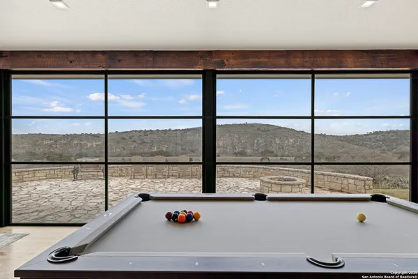 a kitchen with a stove a sink and a refrigerator