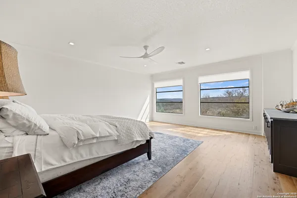 a bed room with a bed and a tv