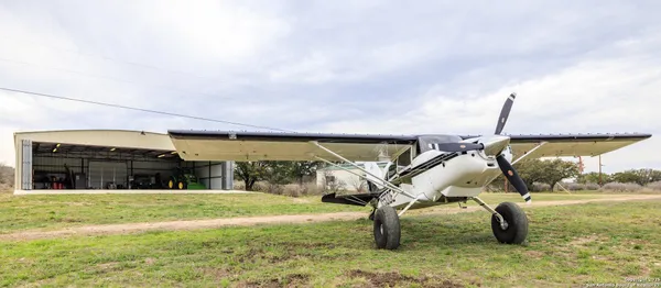 a view of a back yard of the house