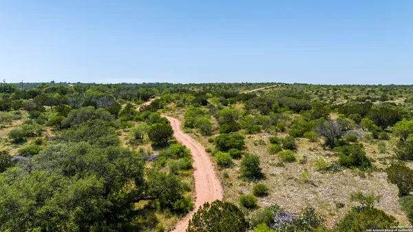 a view of a houses with a yard