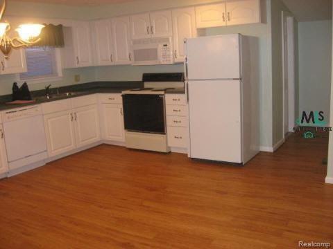 951 Capac Road Allenton, MI 48002 - Photo 3 of 5 915 Capac Kitchen