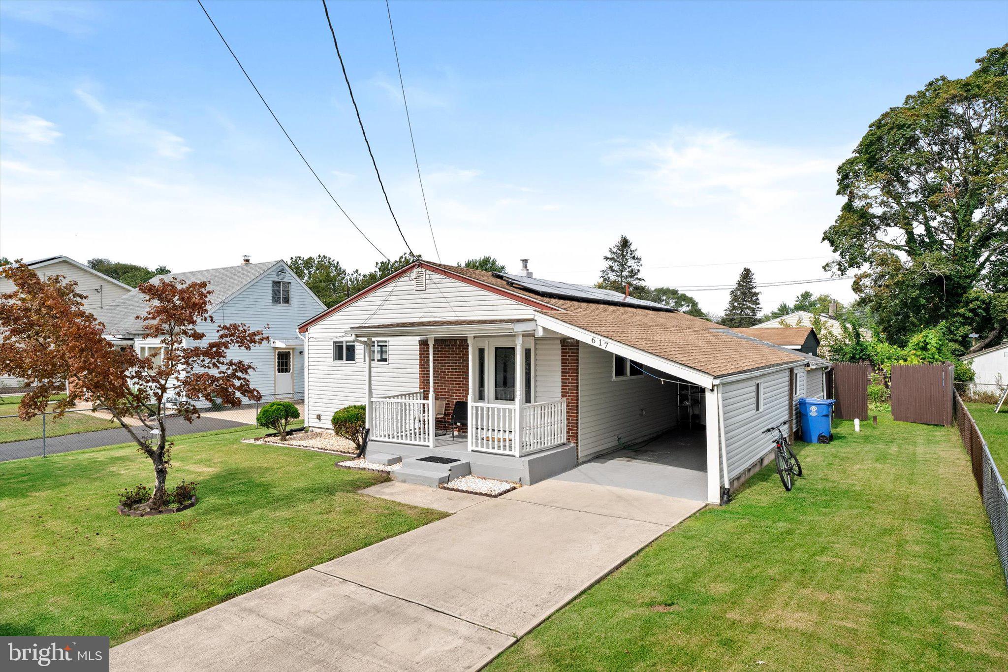 617 Smith Lane Mount Holly, NJ 08060 - Photo 1 of 29 a front view of a house with a yard