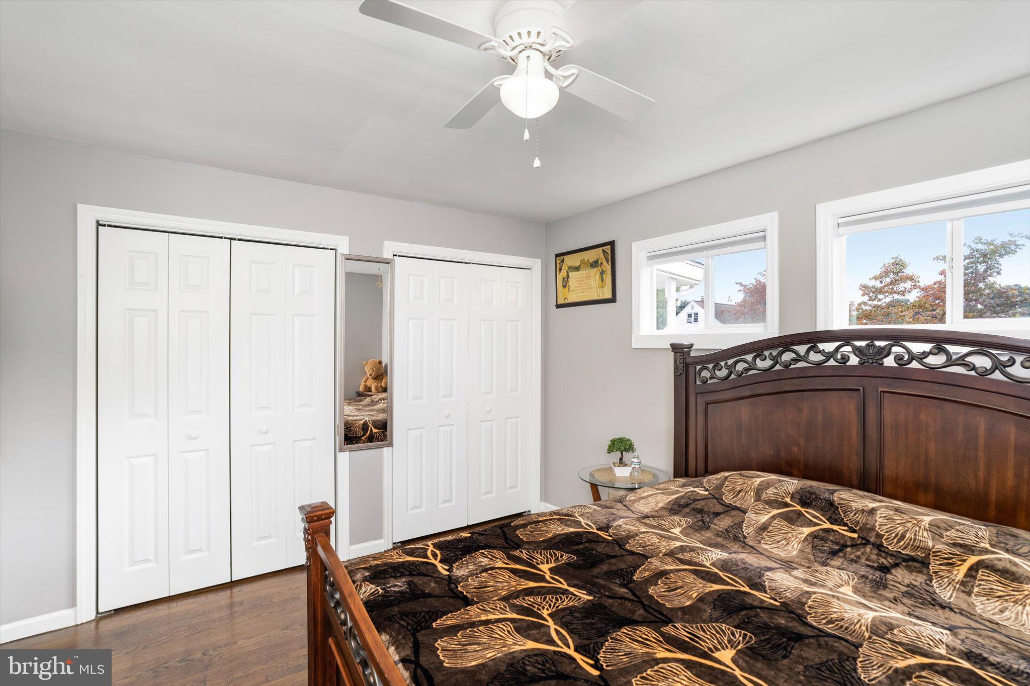 617 Smith Lane Mount Holly, NJ 08060 - Photo 13 of 29 a bedroom with a bed and a chandelier
