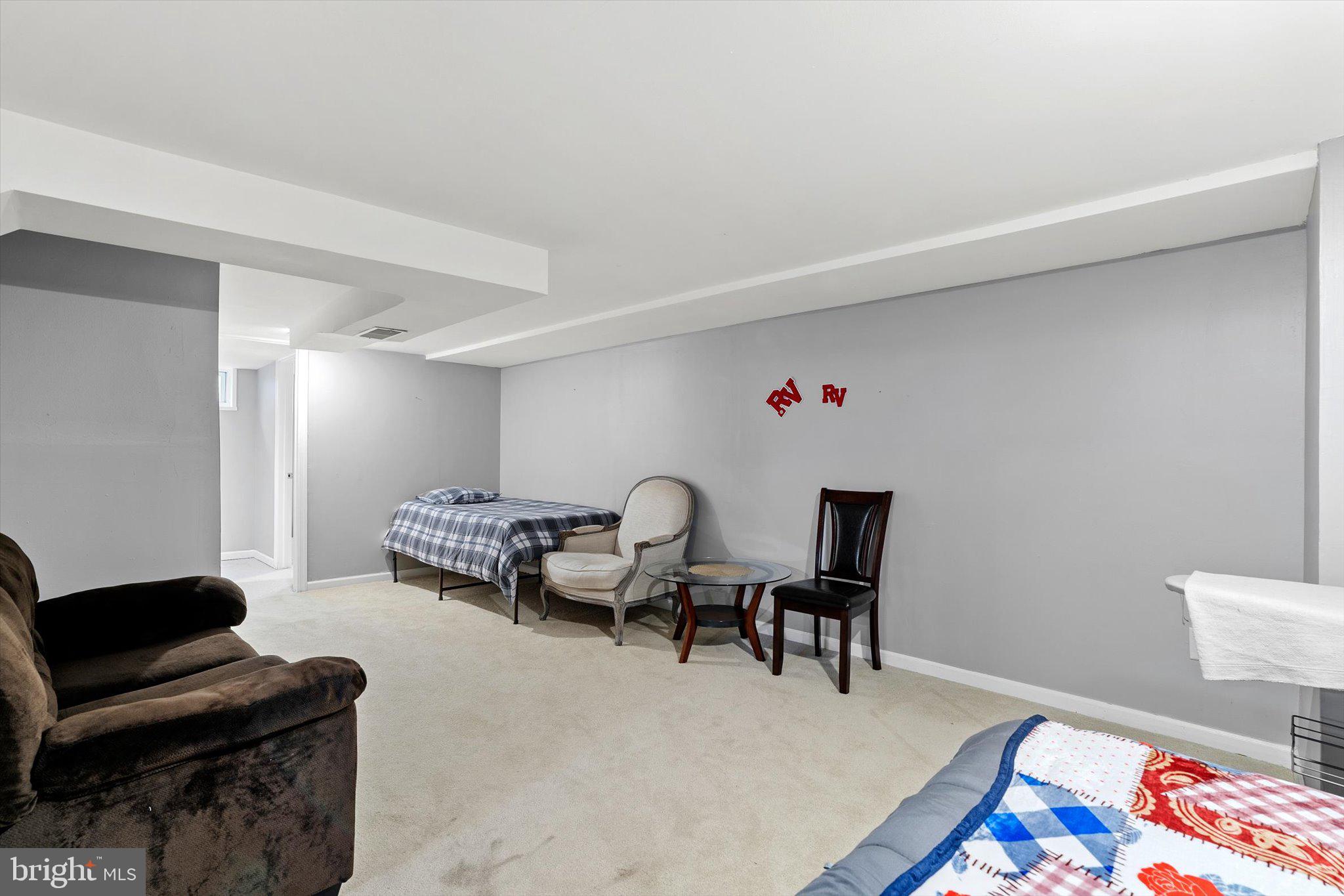 617 Smith Lane Mount Holly, NJ 08060 - Photo 19 of 29 a living room with furniture and a wooden floor