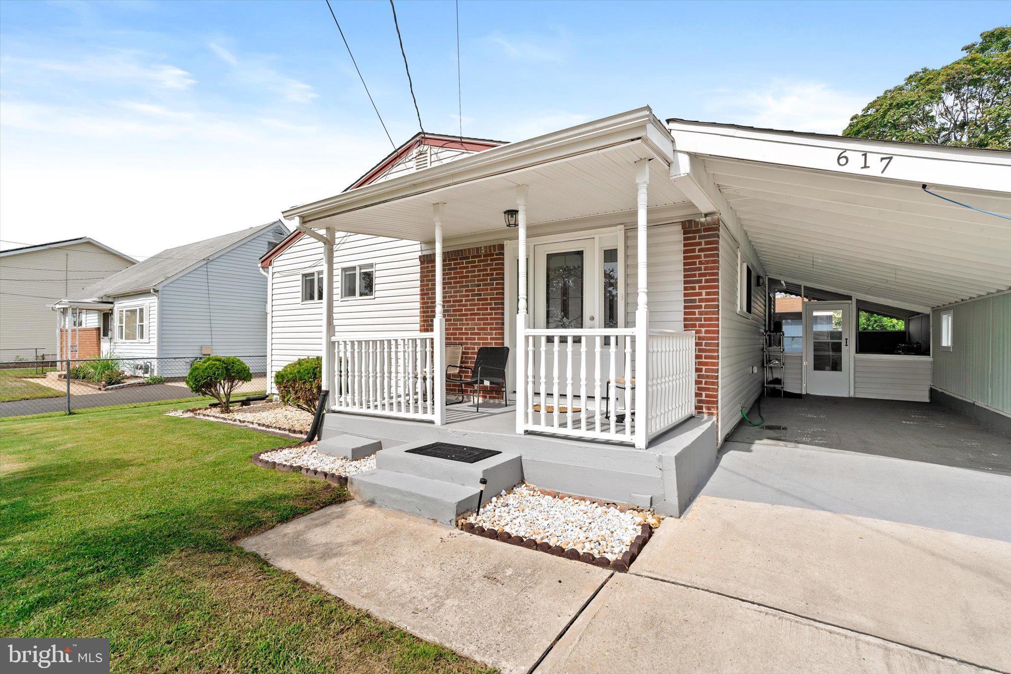 617 Smith Lane Mount Holly, NJ 08060 - Photo 2 of 29 a front view of a house with a yard