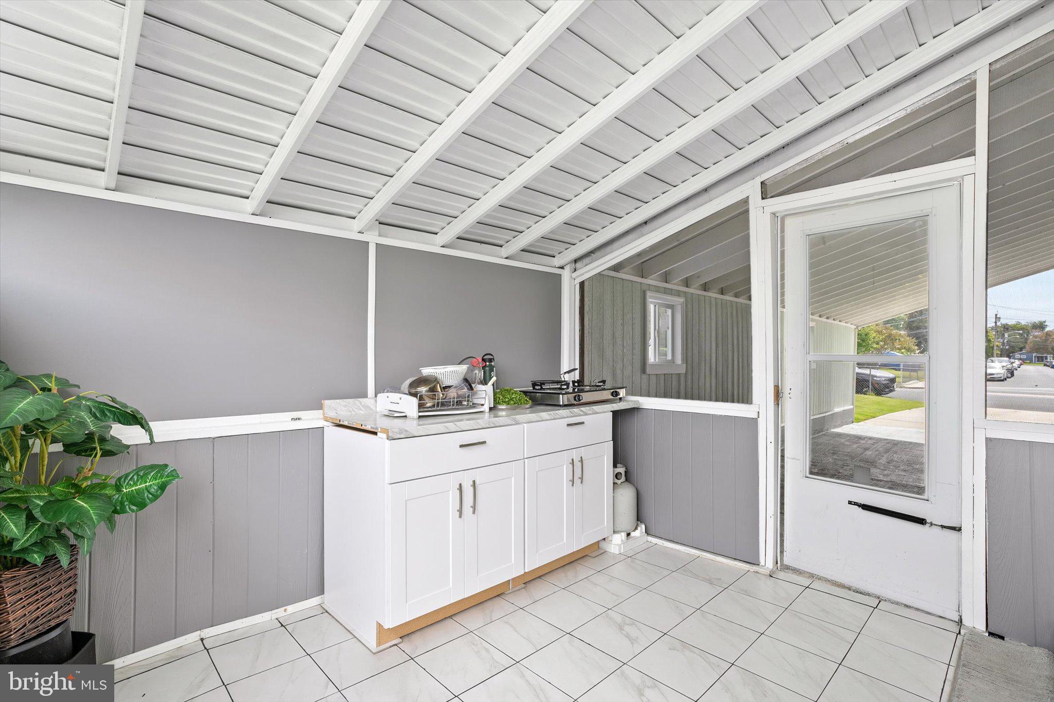 617 Smith Lane Mount Holly, NJ 08060 - Photo 22 of 29 a kitchen with a sink and cabinets