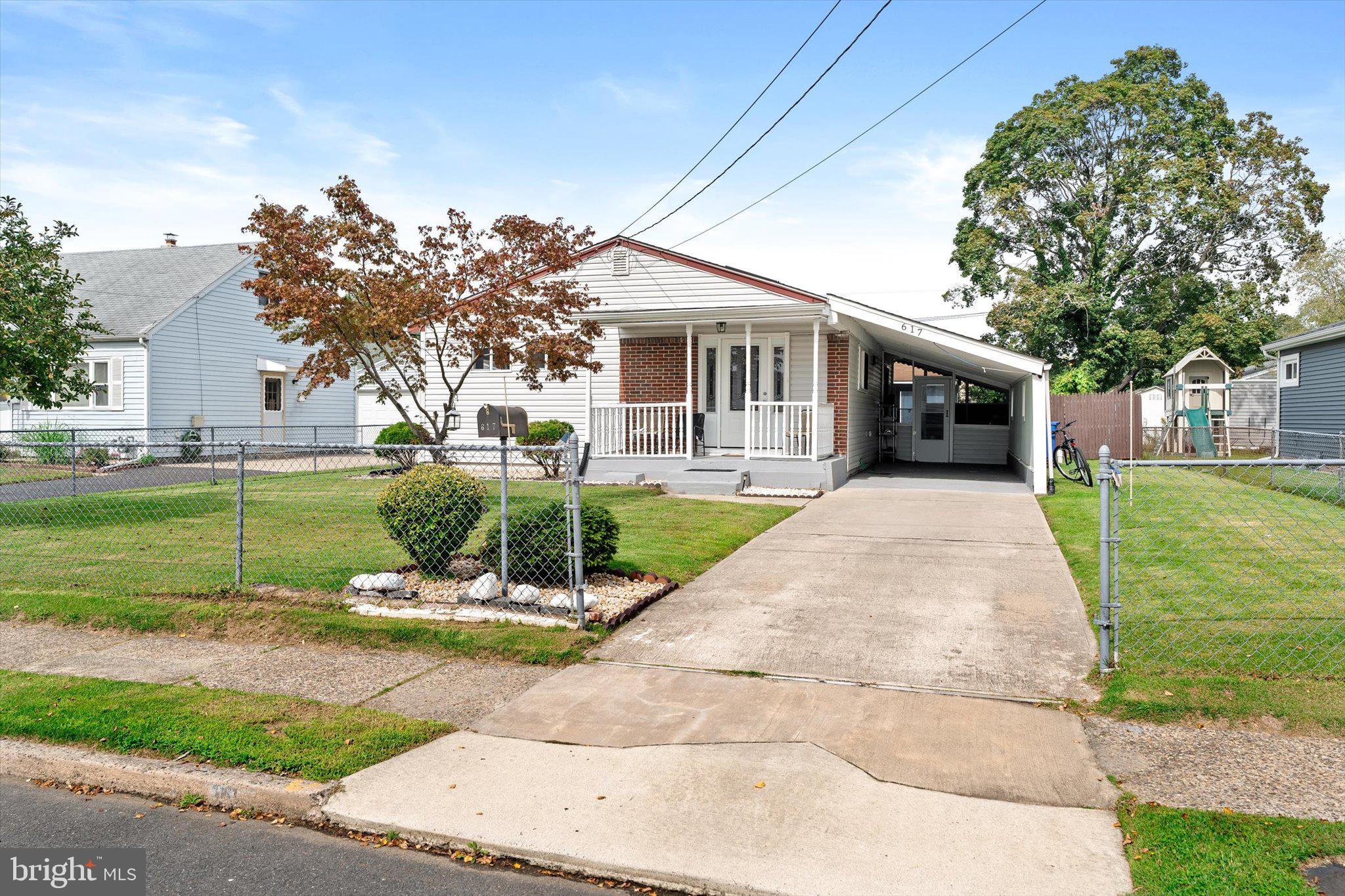 617 Smith Lane Mount Holly, NJ 08060 - Photo 29 of 29 a view of a house with backyard porch and sitting area
