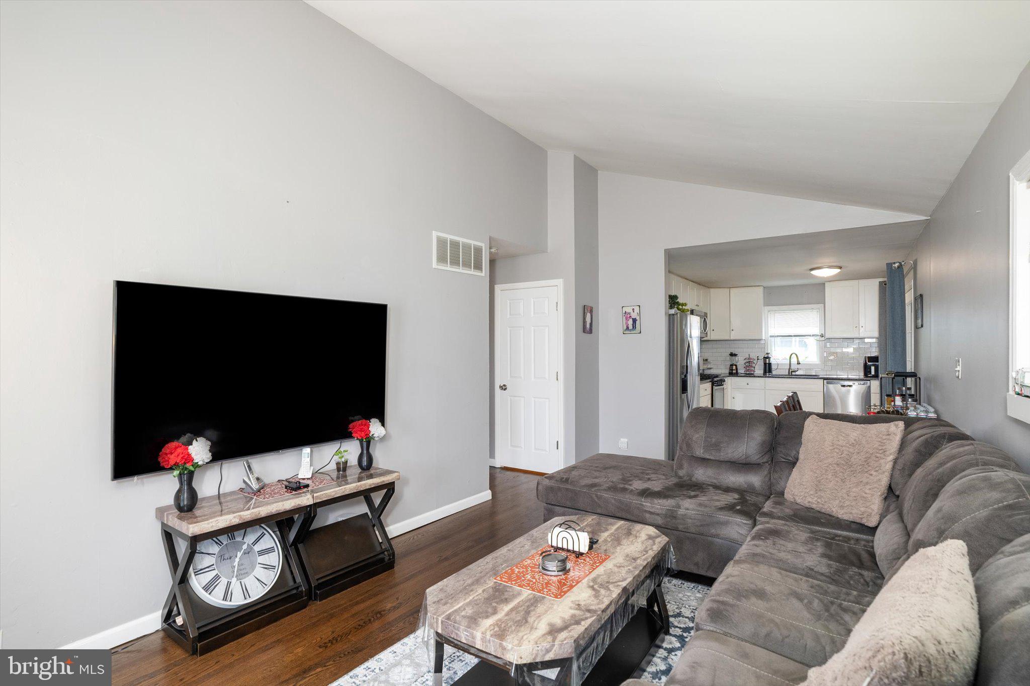 617 Smith Lane Mount Holly, NJ 08060 - Photo 3 of 29 a living room with furniture and a flat screen tv