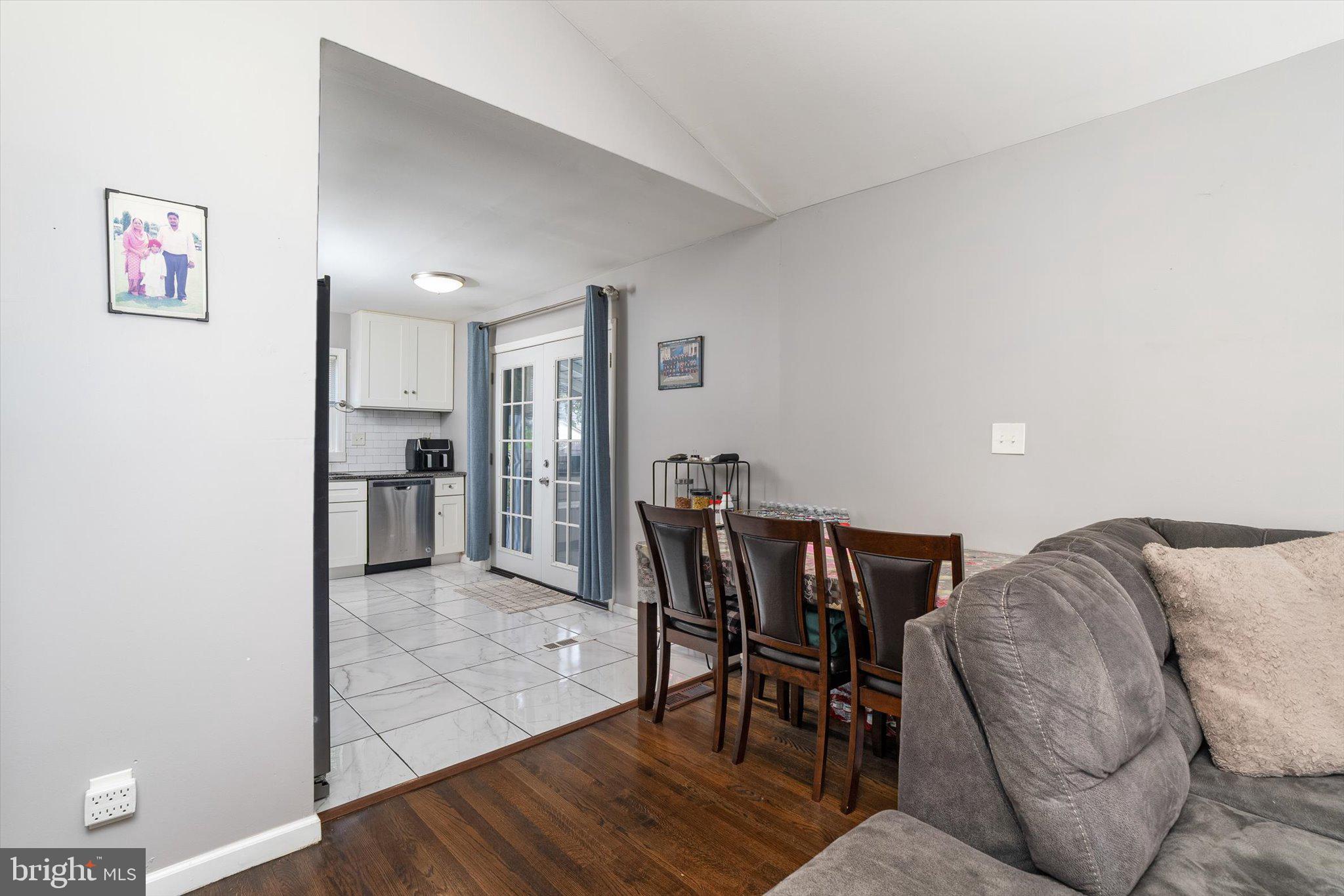 617 Smith Lane Mount Holly, NJ 08060 - Photo 6 of 29 a view of kitchen with dining area and wooden floor
