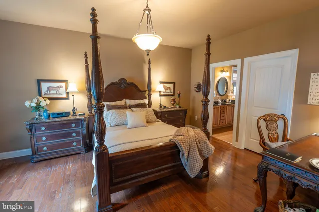 a bedroom with bed and window