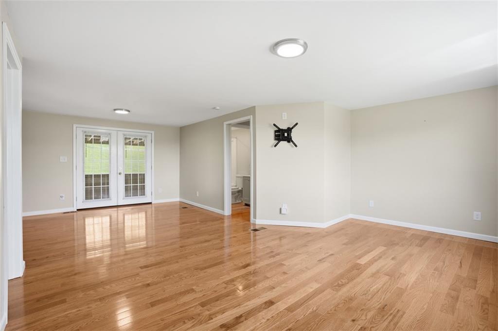213 Fallen Timber Road Avella, PA 15312 - Photo 20 of 44 The living room and dining area flow together, creating an open and welcoming space.
