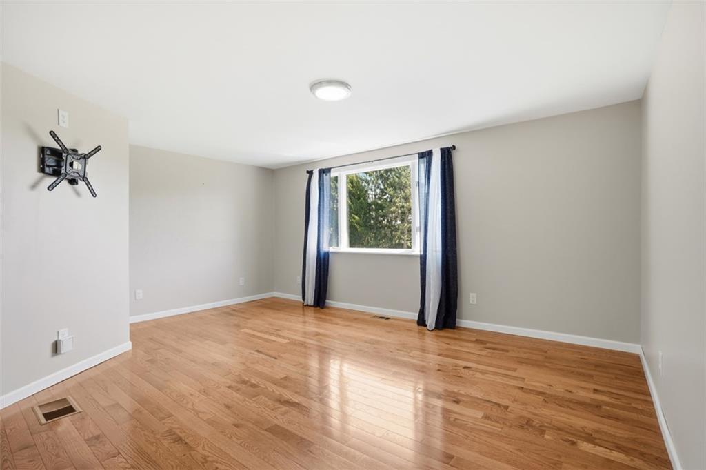 213 Fallen Timber Road Avella, PA 15312 - Photo 21 of 44 The cozy living room offers the perfect place to unwind with family and friends.