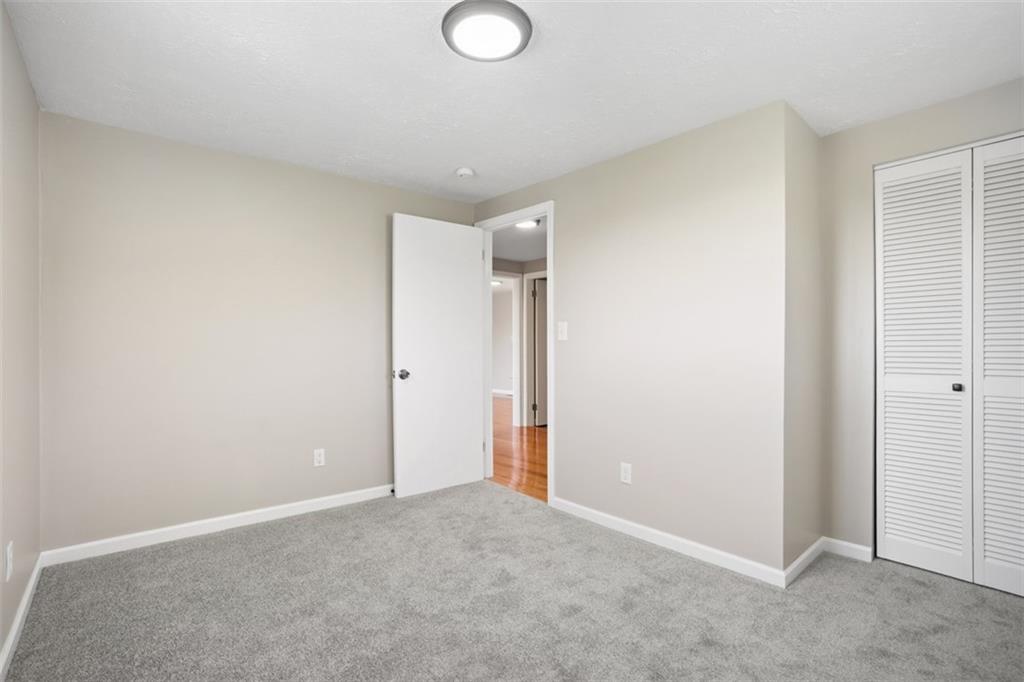213 Fallen Timber Road Avella, PA 15312 - Photo 24 of 44 1st bedroom with ample closet space. New carpet and freshly painted.