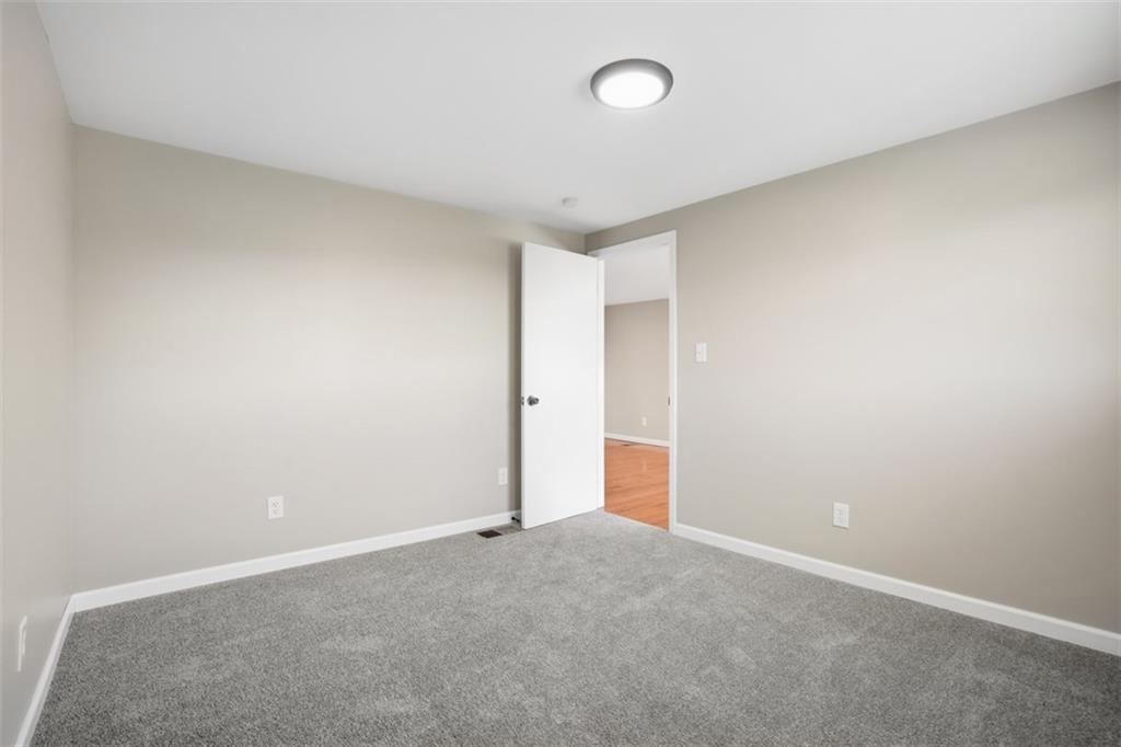 213 Fallen Timber Road Avella, PA 15312 - Photo 26 of 44 3rd bedroom is adjacent from the living and dining area.