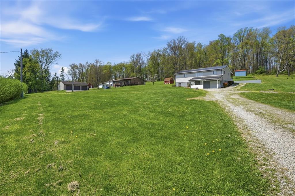 213 Fallen Timber Road Avella, PA 15312 - Photo 37 of 44 A welcoming driveway leads you home, setting the tome for peaceful country living.
