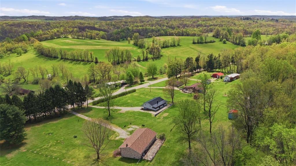 213 Fallen Timber Road Avella, PA 15312 - Photo 41 of 44 These ariel views show the home is nestled in a tranquil country landscape.