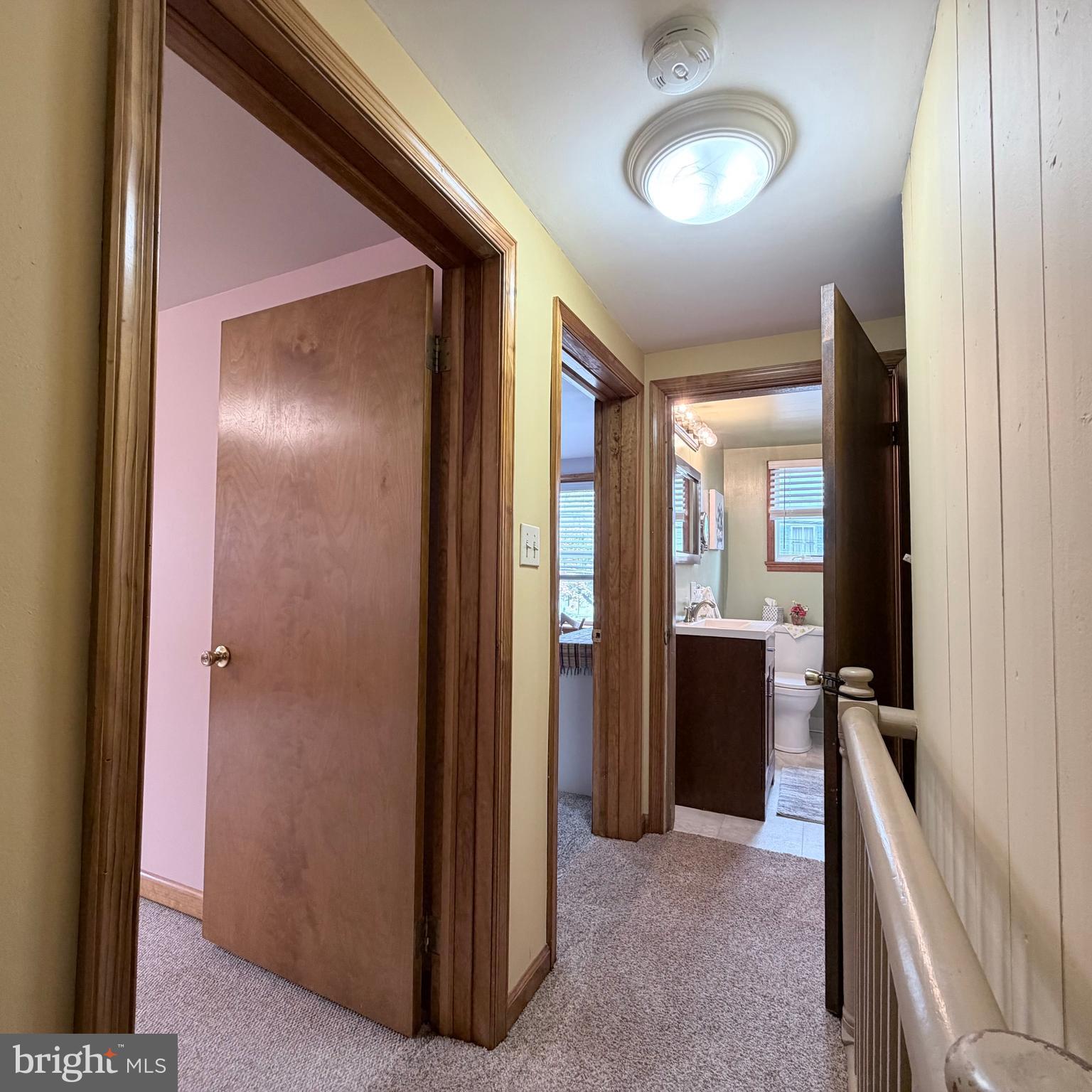 12997 Main Street Fort Loudon, PA 17224 - Photo 31 of 48 a view of a hallway with closet and wooden floor