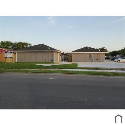 a black and white photo of a house