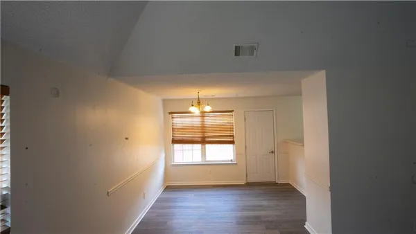 a view of an empty room and window