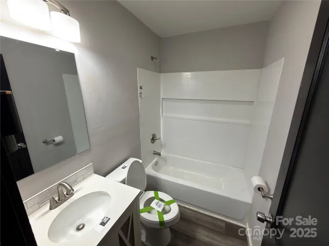 a bathroom with a sink and a bathtub