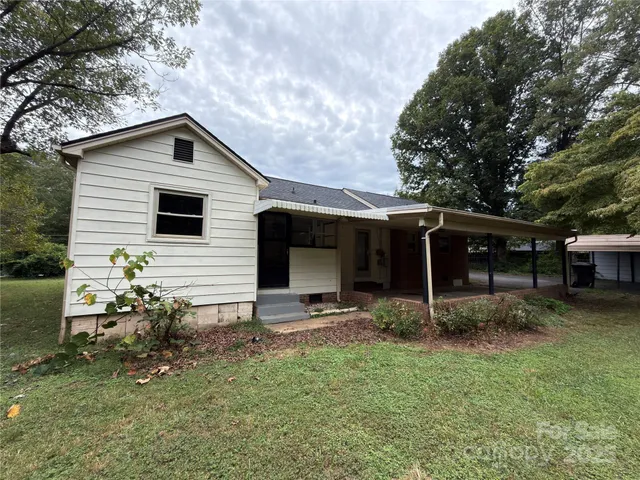 a house view with a garden space