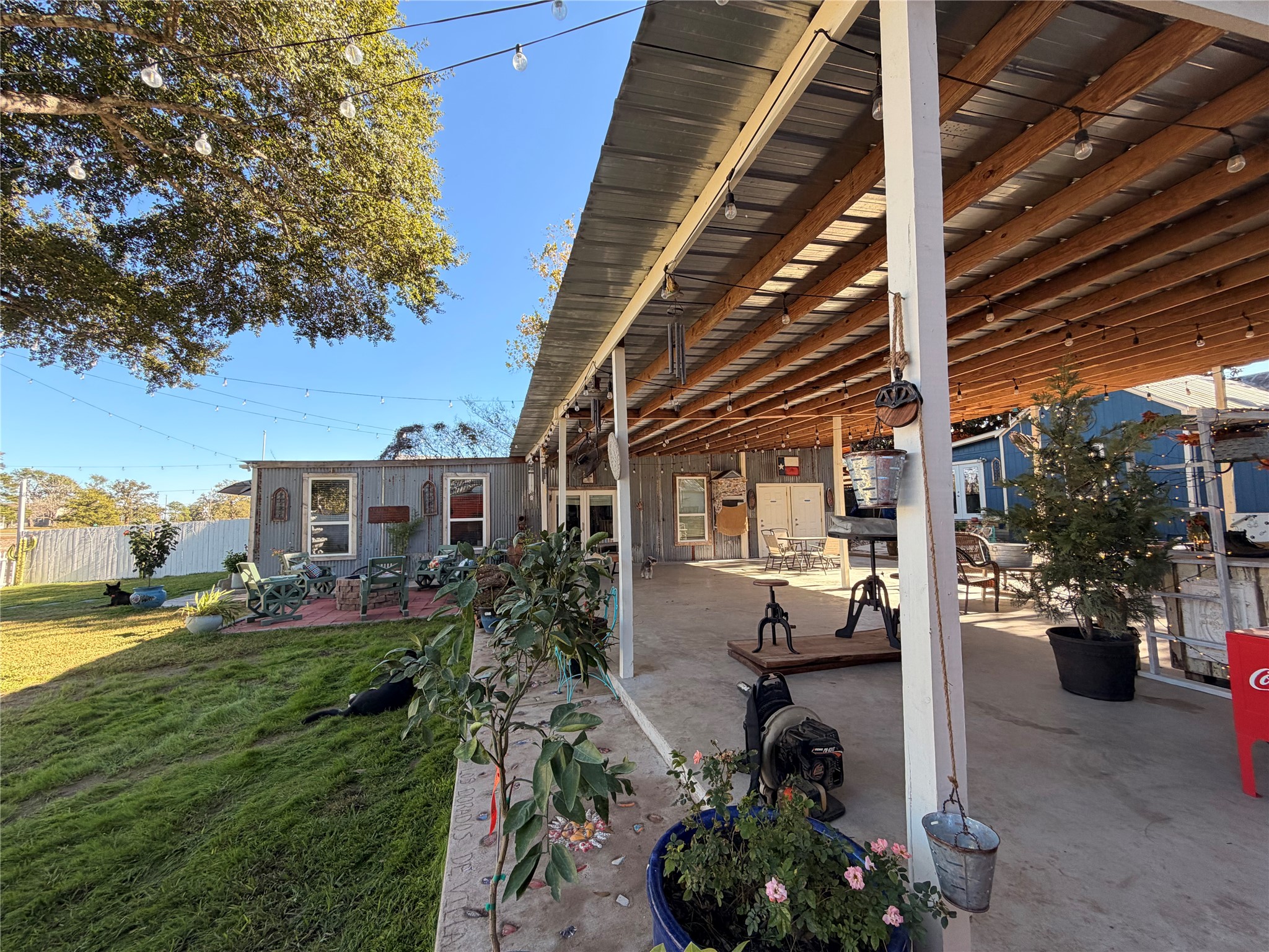 841 South S Loop Winters, TX 79567 - Photo 18 of 22 a view of a porch with chairs and potted plants