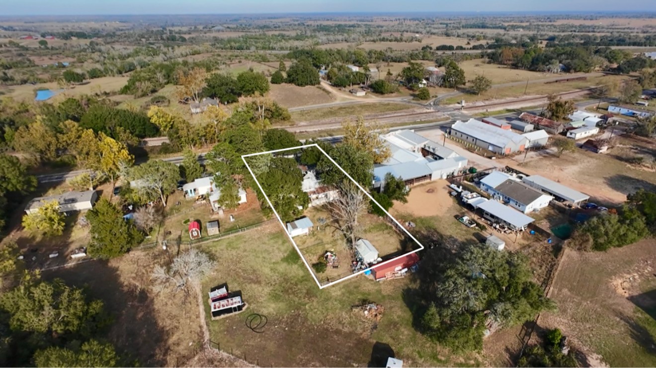 841 South S Loop Winters, TX 79567 - Photo 22 of 22 an aerial view of a city with lots of residential buildings