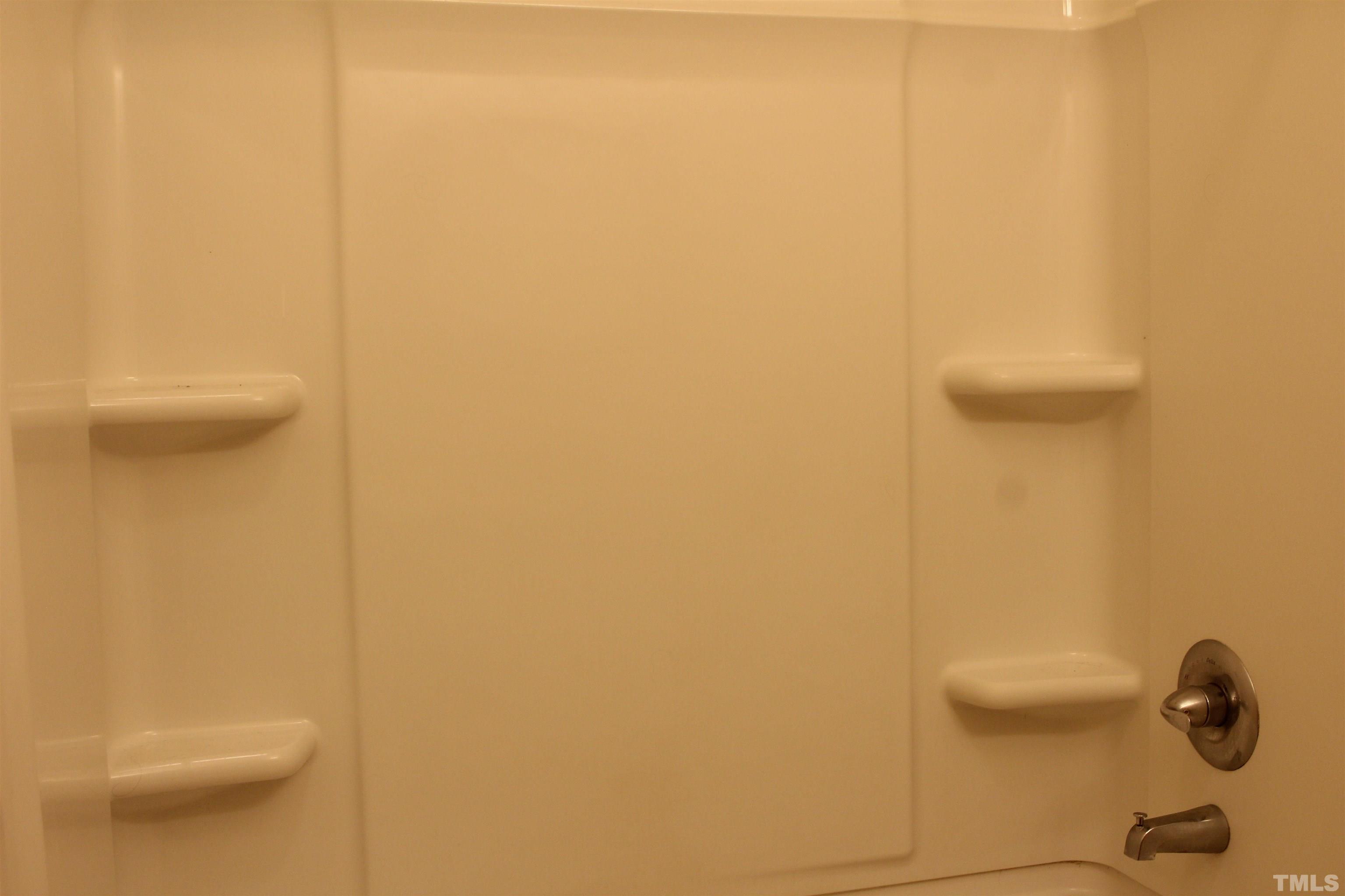 815 East Davie Street Raleigh, NC 27601 - Photo 15 of 21 a bathroom with a shower