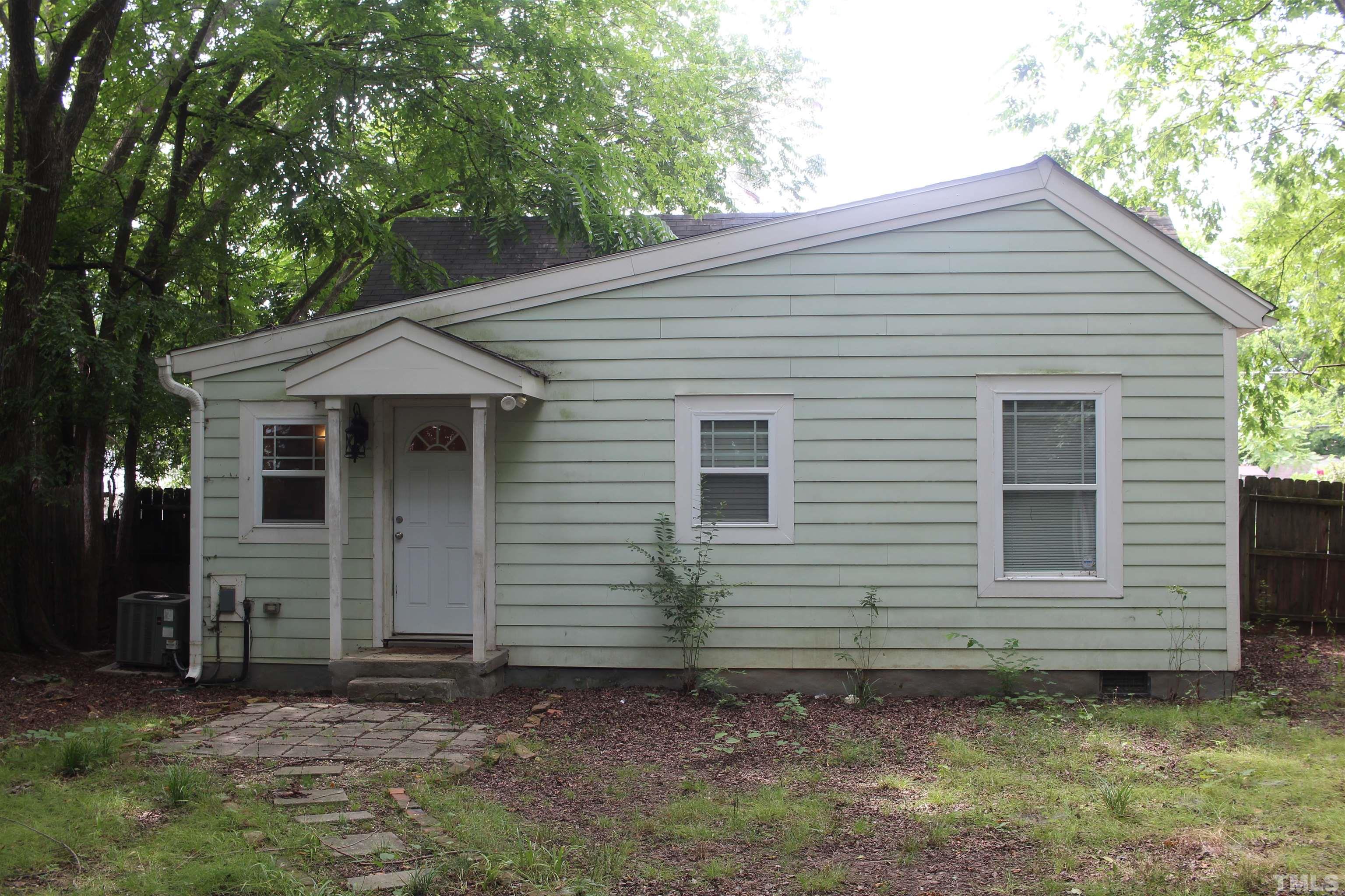 815 East Davie Street Raleigh, NC 27601 - Photo 19 of 21 a view of a house with a yard