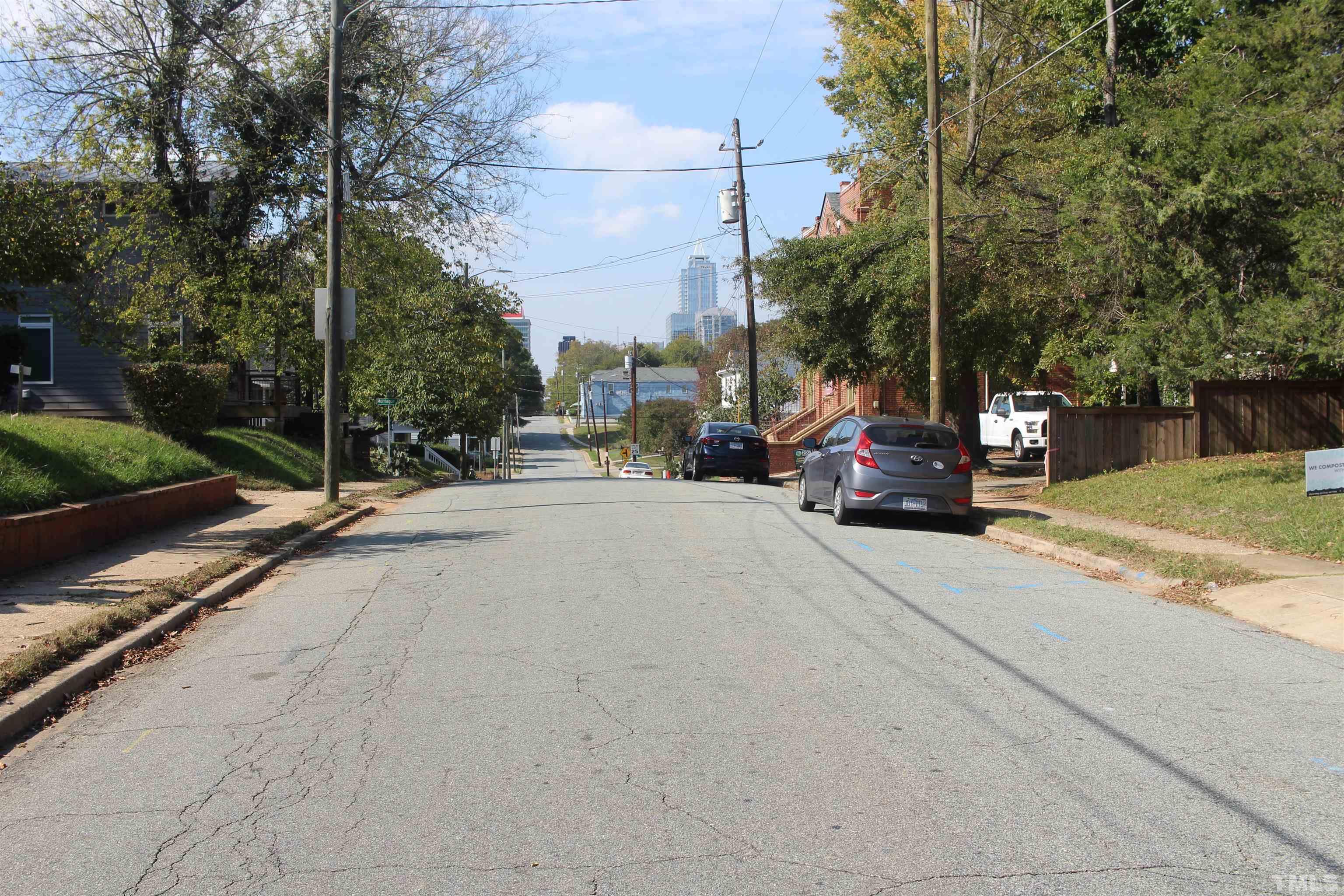 815 East Davie Street Raleigh, NC 27601 - Photo 20 of 21 a view of street with tall buildings