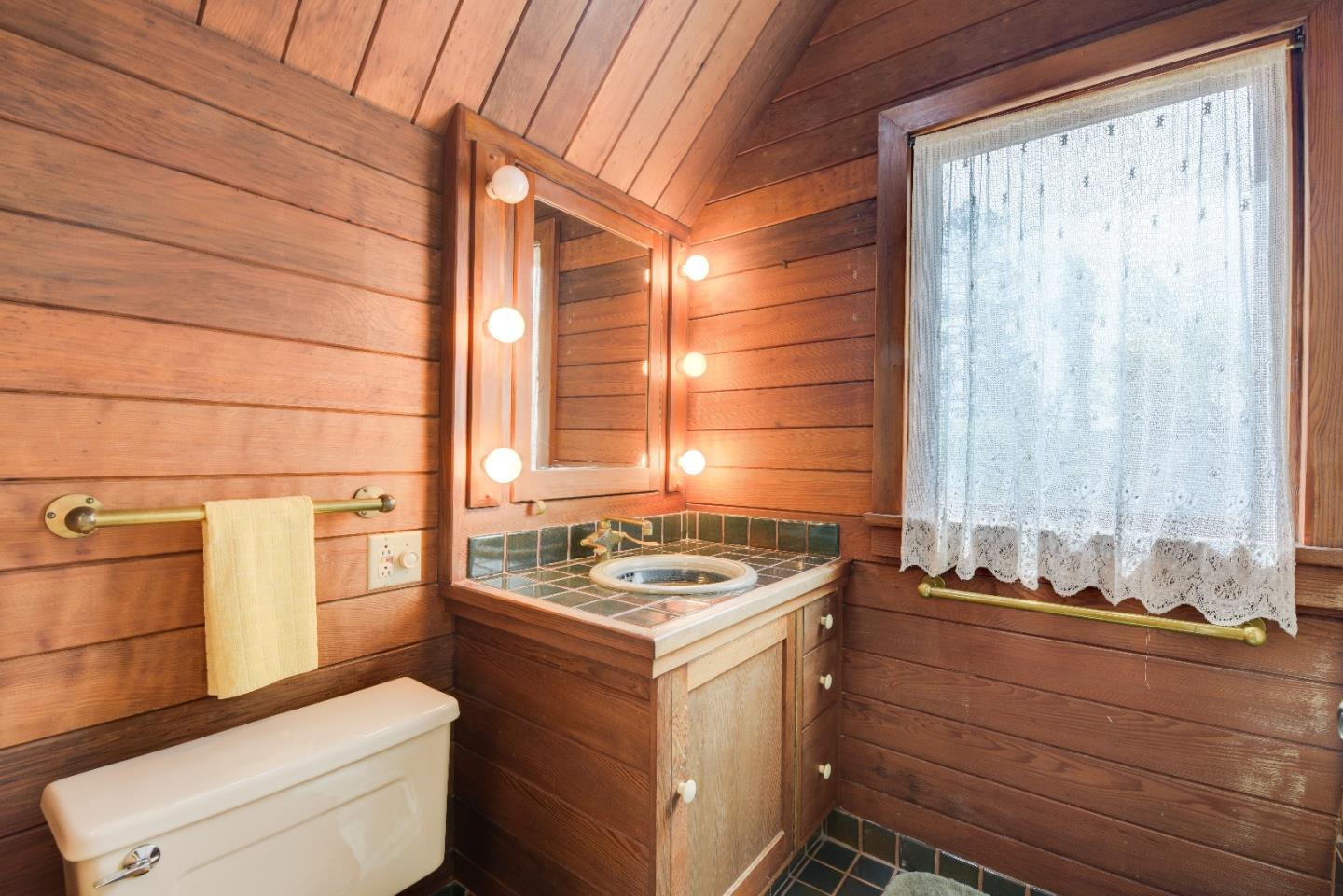 2325 Corona Court Berkeley, CA 94708 - Photo 25 of 25 a bathroom with a granite countertop sink and a toilet