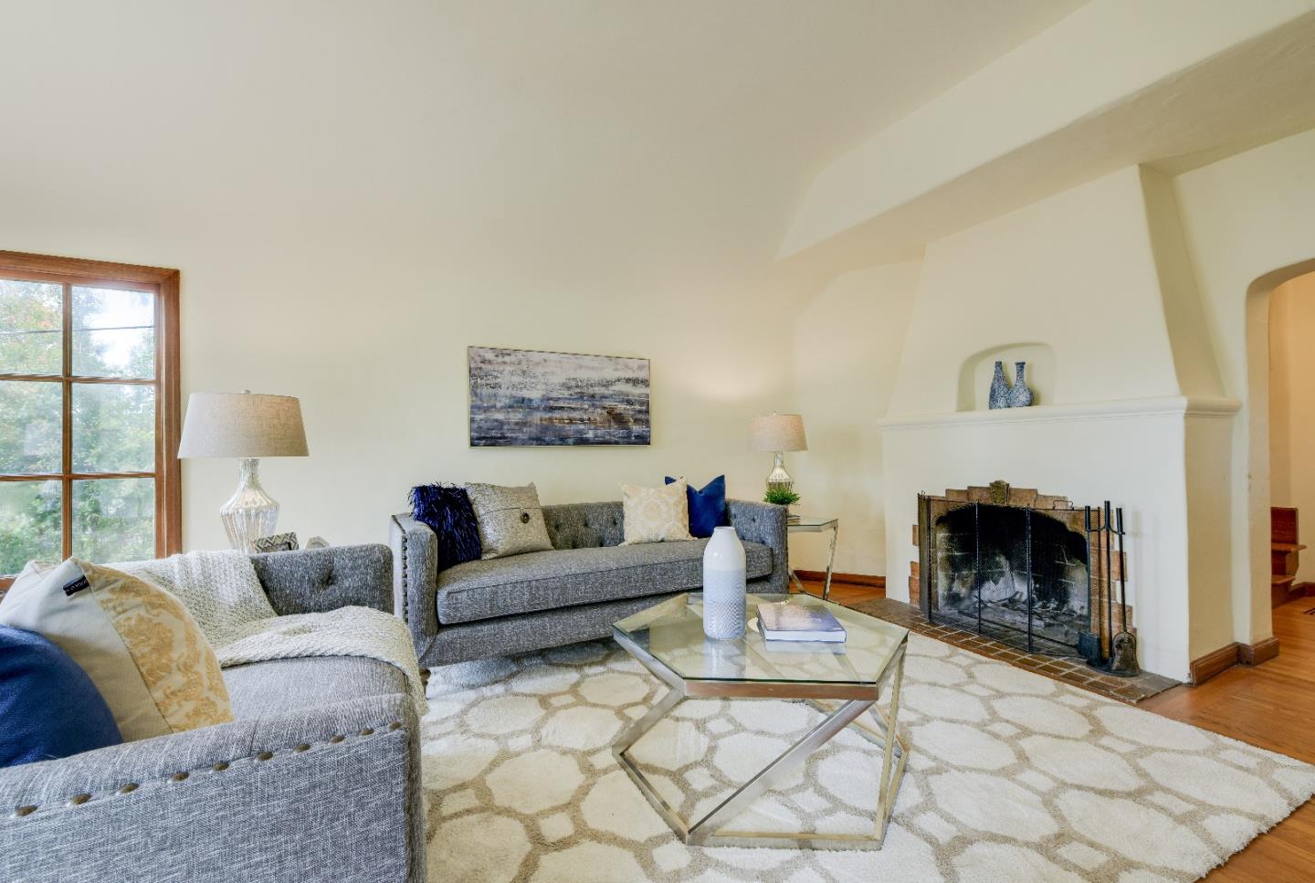 2325 Corona Court Berkeley, CA 94708 - Photo 4 of 25 a living room with furniture and a fireplace