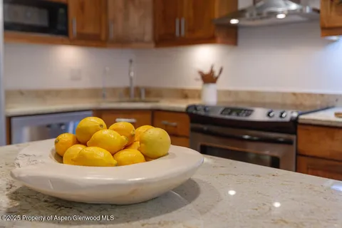 a white bath tub sitting in a kitchen