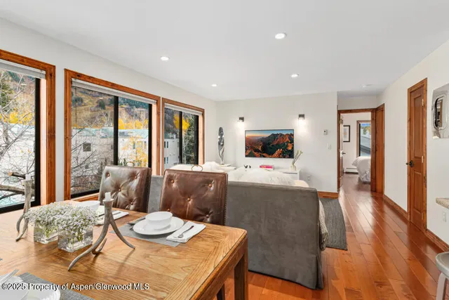 a living room with furniture and a table