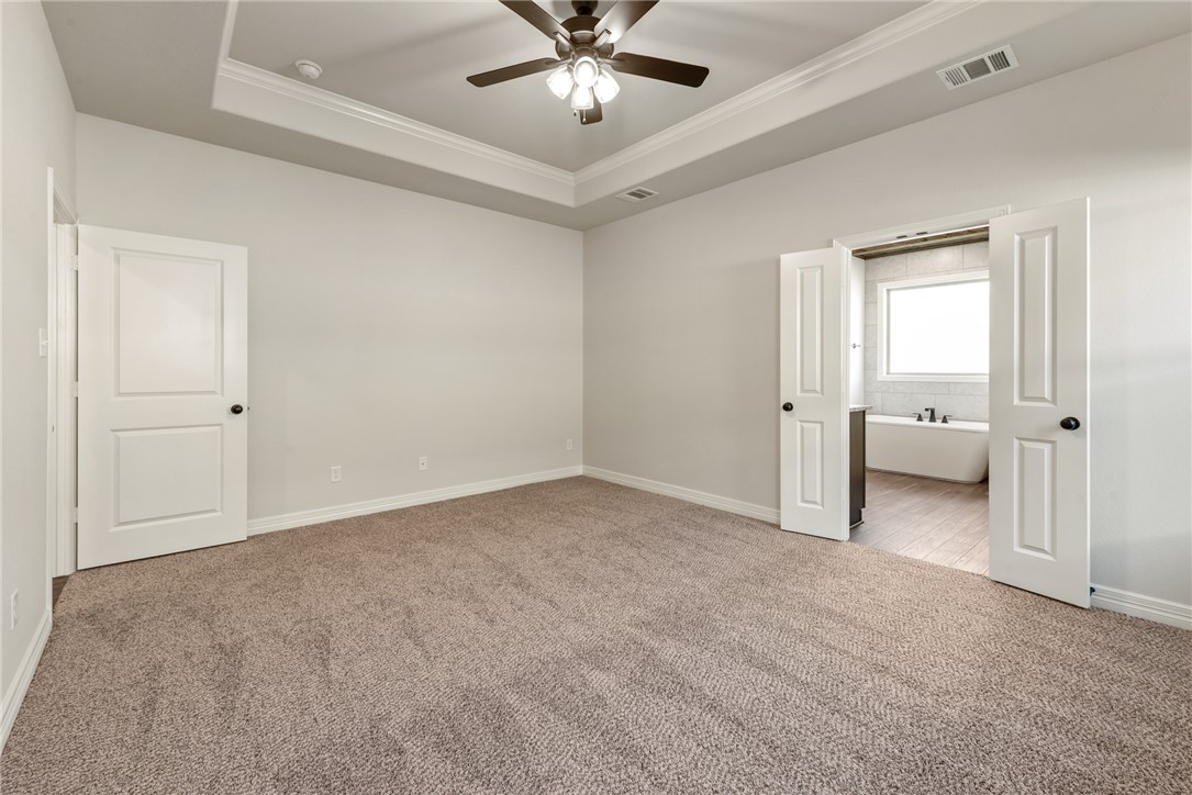 2813 Spector Drive Bryan, TX 77808 - Photo 26 of 42 a view of a livingroom with a ceiling fan