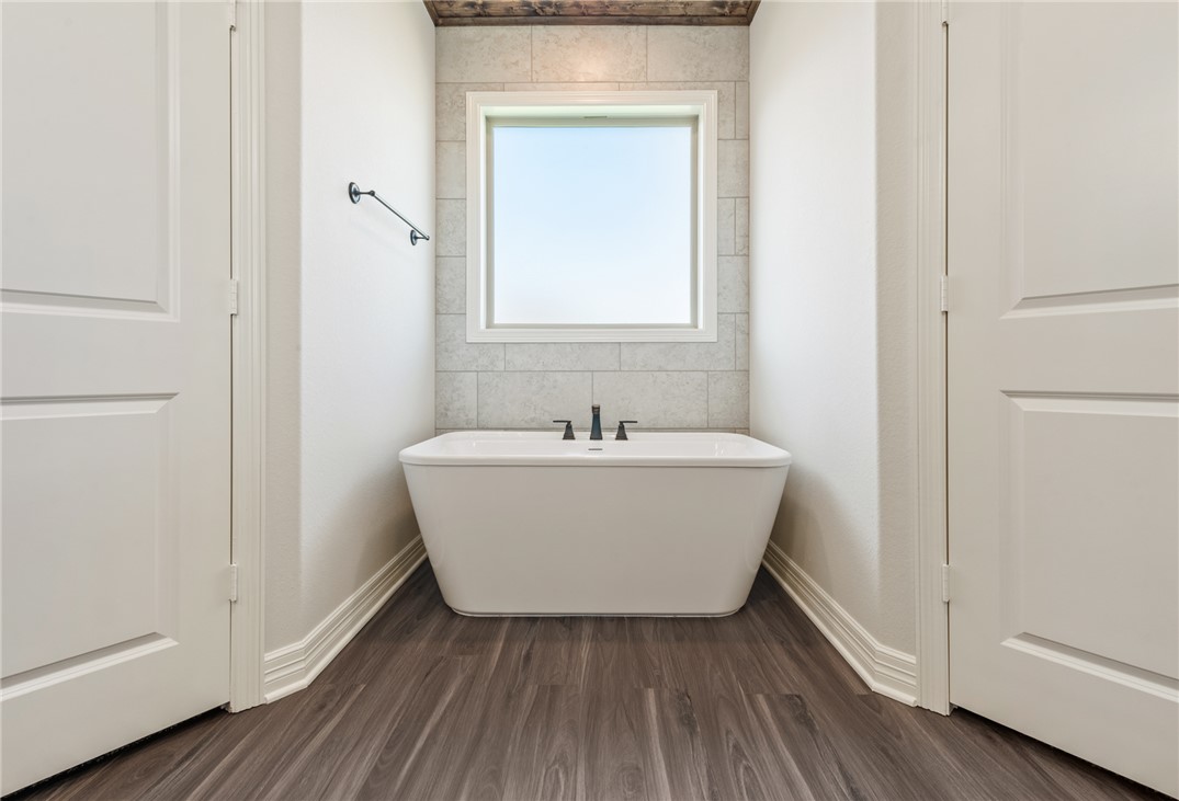 2813 Spector Drive Bryan, TX 77808 - Photo 31 of 42 a white room with wooden floor