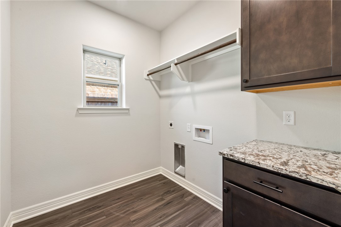 2813 Spector Drive Bryan, TX 77808 - Photo 34 of 42 a view of storage and utility room in wooden floor
