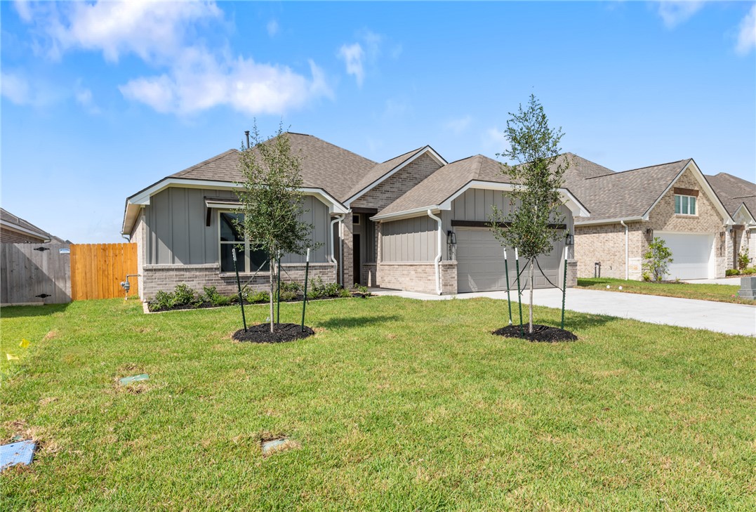 2813 Spector Drive Bryan, TX 77808 - Photo 5 of 42 a house view with a garden space