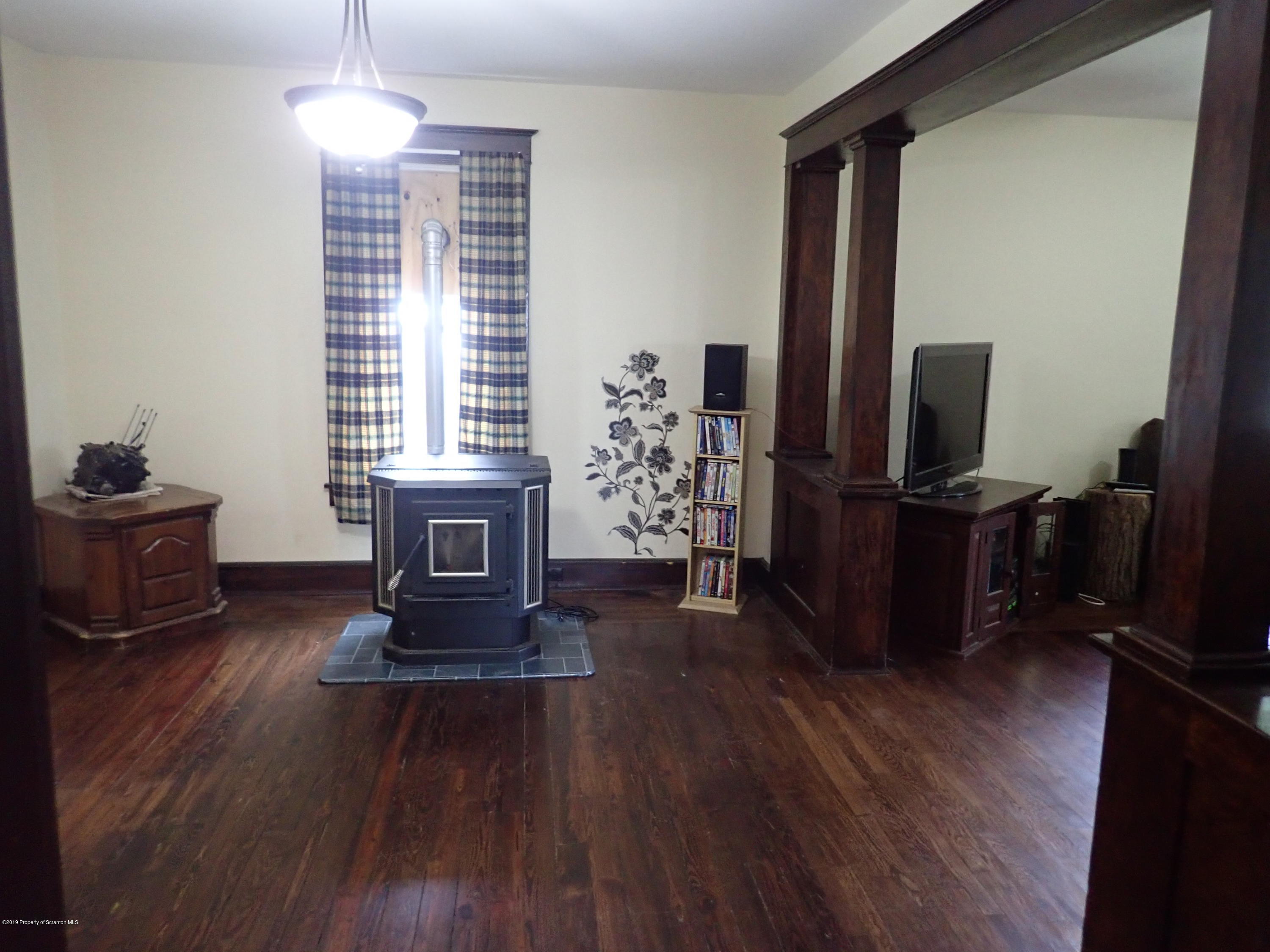 1936 Ridge Road, Unit SOUTH Montrose, PA 18801 - Photo 6 of 34 a living room with furniture and a flat screen tv